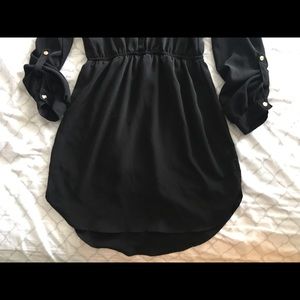Black dress with mid sleeves.